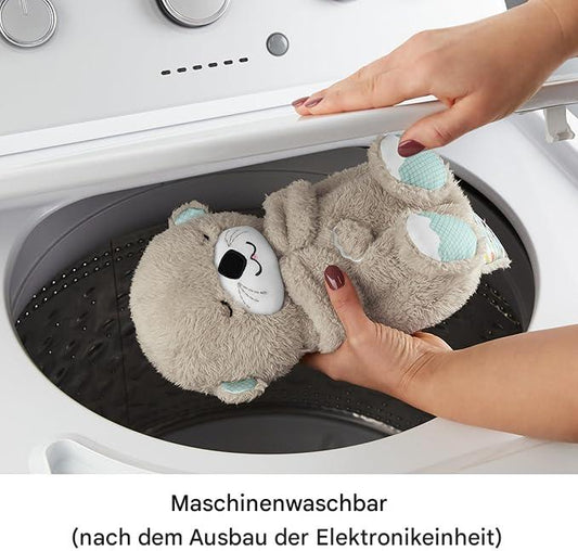 Plüsch-Otter Kuscheltier wird in Waschmaschine gelegt, maschinenwaschbar, weiches Stoffspielzeug